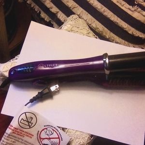 Instyler curling iorn/brush.